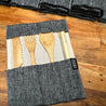 Photo of a Sarita Bamboo flatware set with jute and cotton case