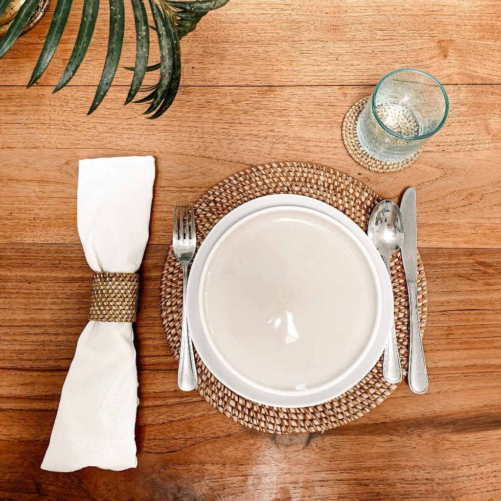 natural rattan placemat set on a dining table